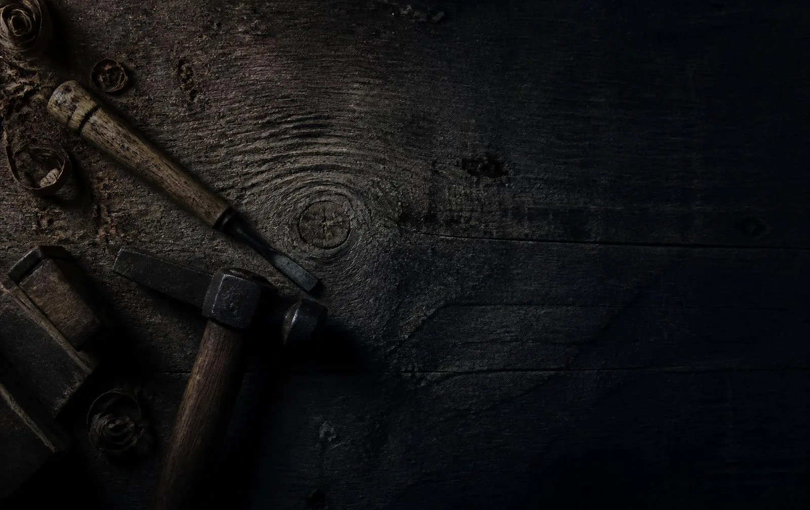 Weathered timber and tools at an Alaskan property